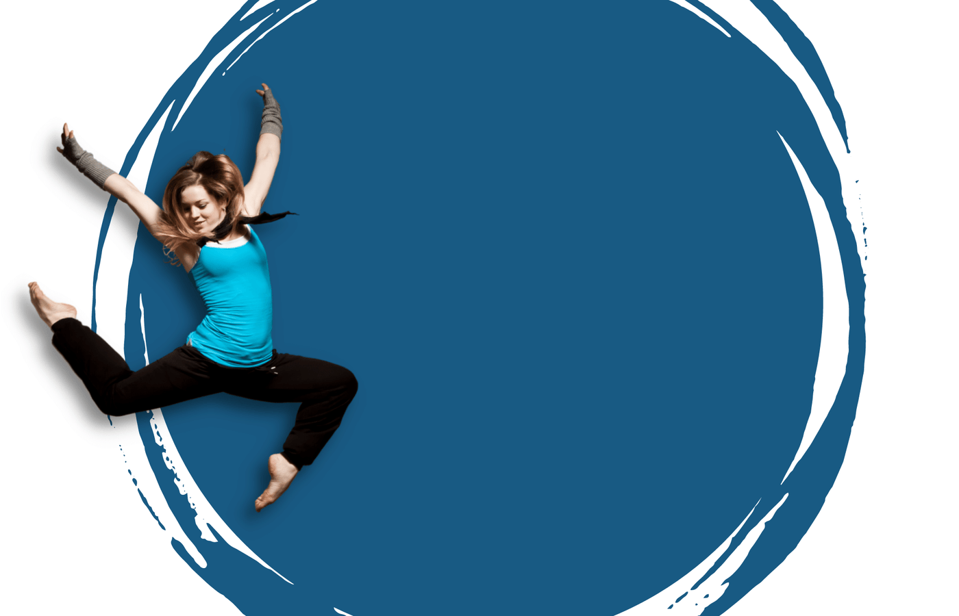 A teen female dancer, wearing black pants, bright teal top, grey fingerless gloves. She is jumping with both legs bent and arms up high..The background has a light blue/grey large paint splat over a light grey backdrop.